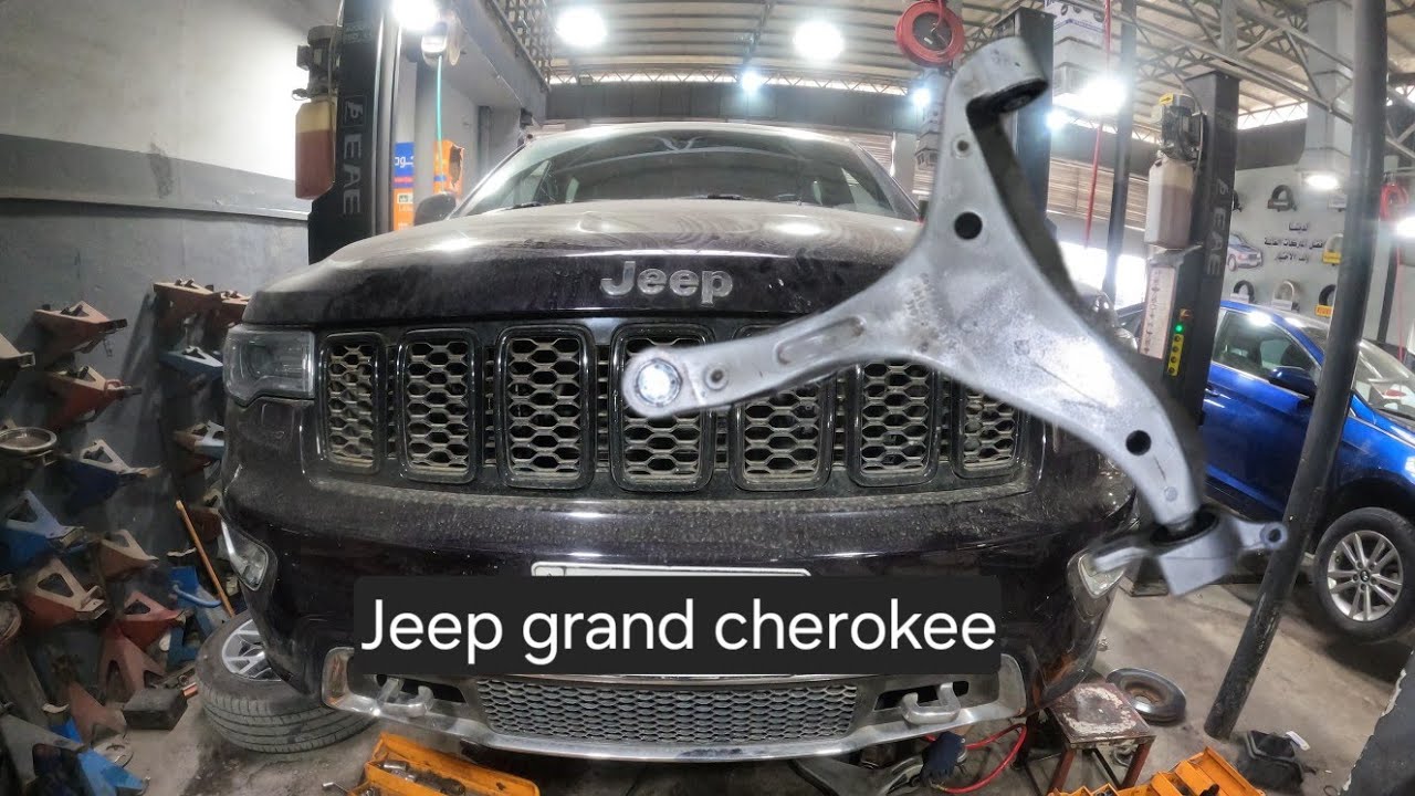 how to replace front lower control arm ... jeep grand cherokee 2016 ...