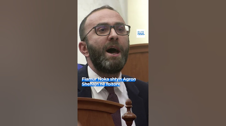Flamur Noka shtyn Agron Shehajn në foltore