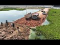 Amazing 100 completed work a new road crossed water the large bulldozer shantui is moving dirt