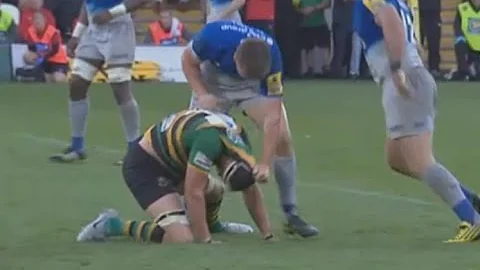 Owen Farrell is not pleased by late tackle. [North...