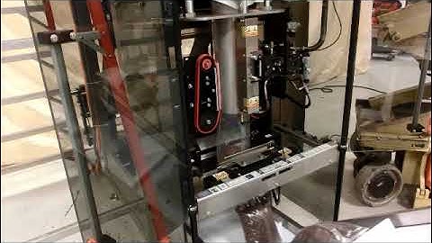 Elete Vertical Form Fill Seal Machine - Filling 4lb Cups of Coffee Beans @ 50 bpm