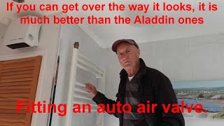 Automatic Bottle Air Valve On A Towel Rail.