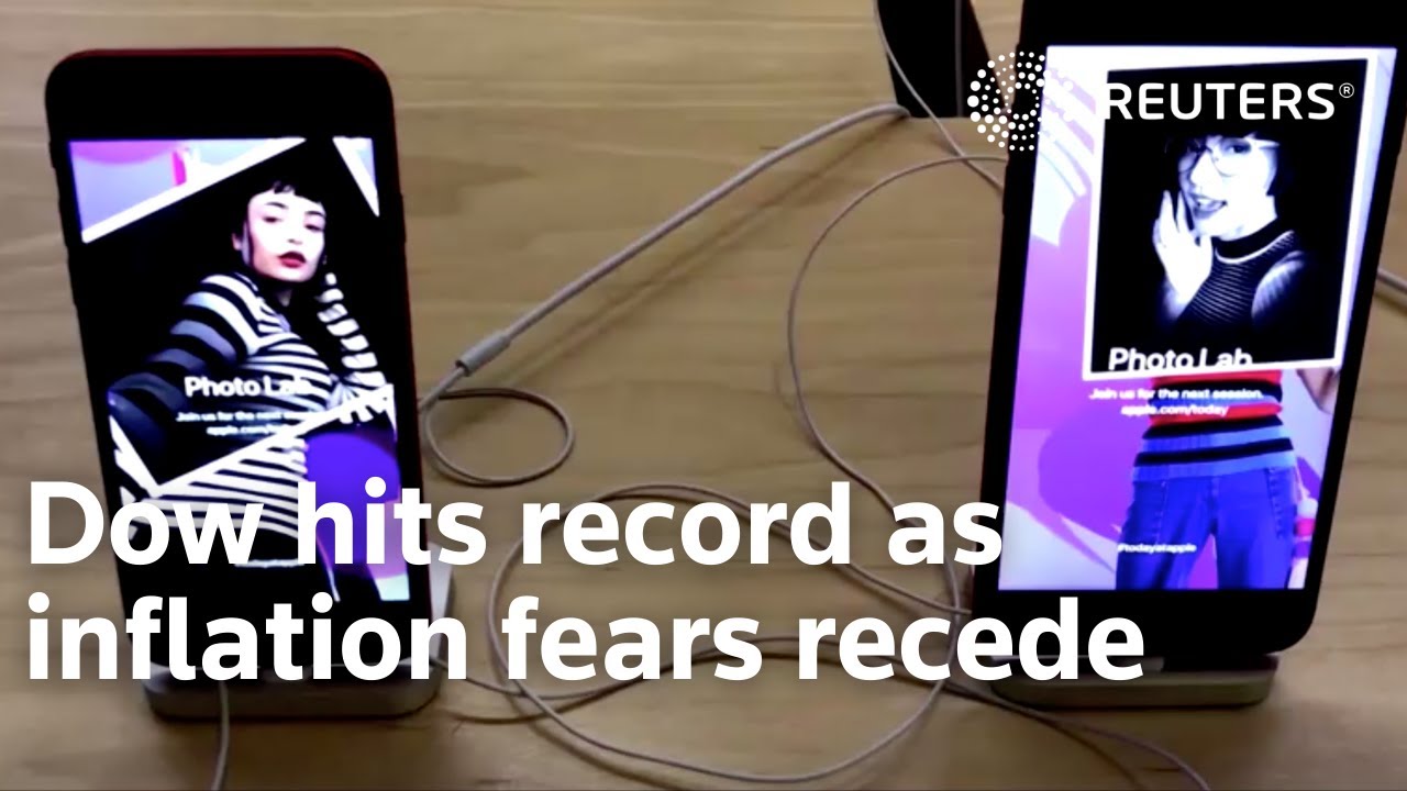 Dow hits record as inflation fears recede