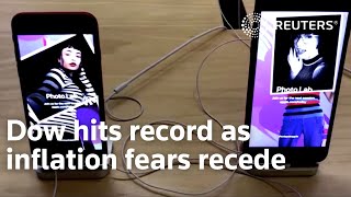 Dow hits record as inflation fears recede