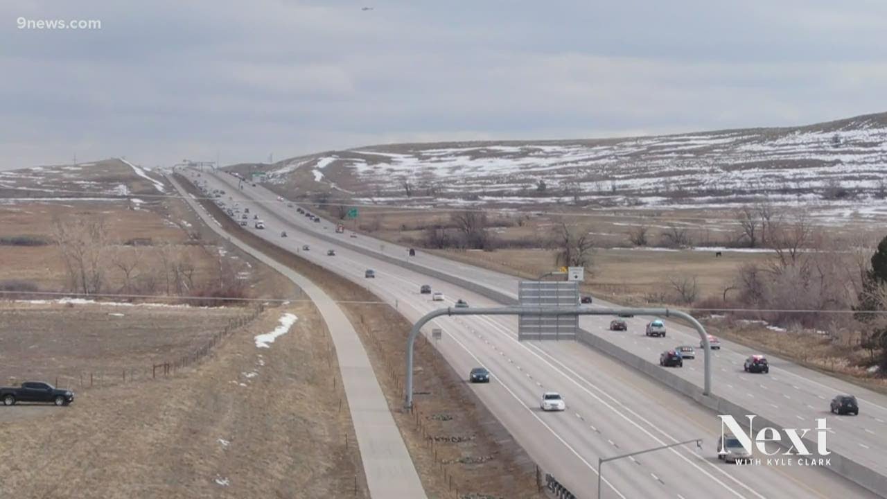 Community stops to watch procession for officer killed in grocery store shooting