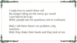 Enrique Bunbury - Watching the Wheels Lyrics