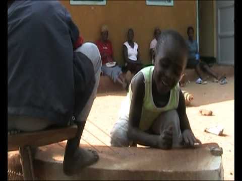 Joseph singing with drum at Orphan Club Tororo Uga...