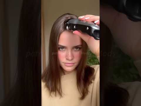 Ai Self Headshave Woman Shaves The Middle Of Her Head With Hair Clippers