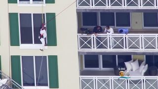 Crews Lower Dangling Man To Safety After Scaffolding Collapse