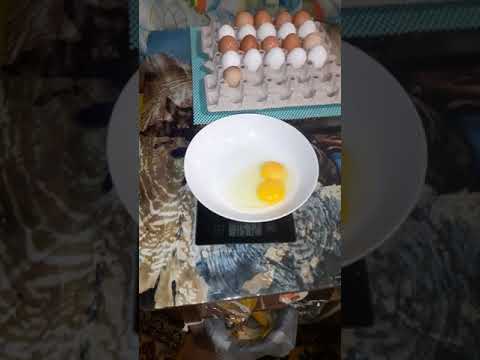 сколько  весит куриное яйцо???