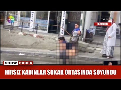 Hırsız kadınlar sokak ortasında soyundu