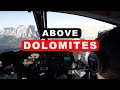 Flying a helicopter above the most beautiful mountain range in europe  the dolomites