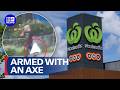 Man armed with axe allegedly threatens supermarket staff | 9 News Australia