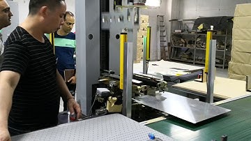 Rigid box making machine