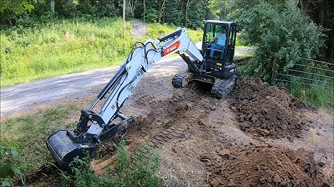 Installing 12" culvert pipe with bobcat e42 mini excavator PT 1