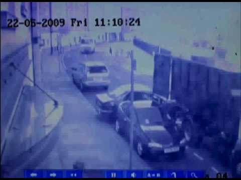 A cycling Lord Mayor of London, Boris Johnson, almost comes a cropper with a cockney trucker. No Boris's were harmed in the reviewing of this CCTV footage - he can be seen cycle helmet in hand wandering slightly befuddled taking in the scene of carnage.