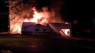 Firefighters battle large commercial structure fire on West Gordon in the City of Rossville