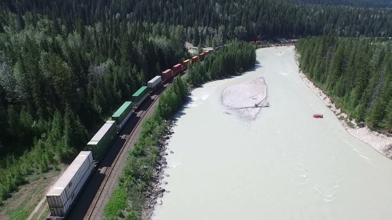 Rafts depart our BBQ lunch spot for middle canyon rapids   Golden, BC