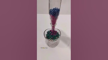 Colourful Pearls Drop from Bottle. #reverse #satisfying #oddlysatisfying #drop #asmr #shorts