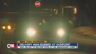 Pizza delivery man robbed at gunpoint