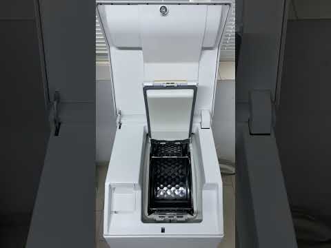 Стиральная машина Miele вертикальной загрузки с русским языком