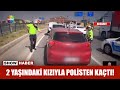 2 yaşındaki kızıyla polisten kaçtı!