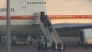 犠牲の９遺体帰国 アルジェリア人質事件で官房長官