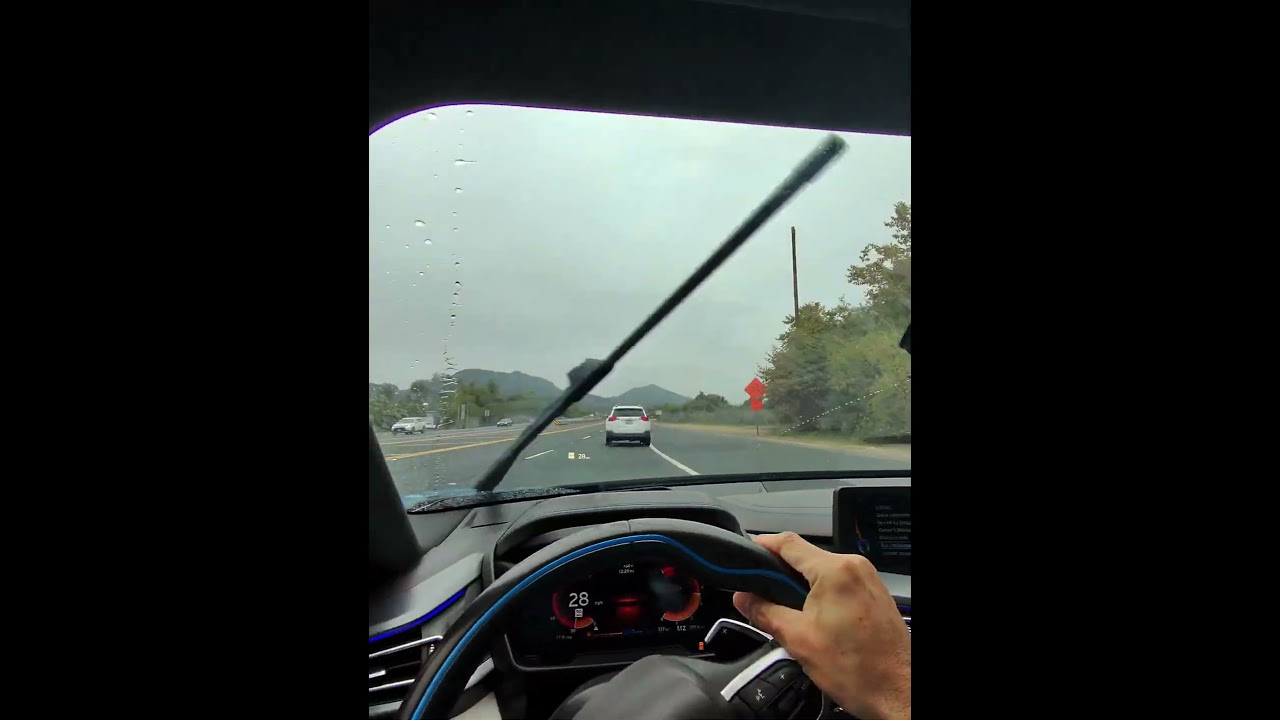 BMW i8/raining practice controlling oversteering with throttle and minimum steering