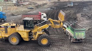 Caterpillar 992G Wheel Loader Loading Coal On Trucks With One Pass  Mega Machines Movie