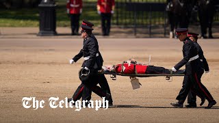 Soldiers faint in scorching London heat as Prince William inspects troops