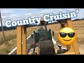 Country cruising - hauling heavy equipment with Mack truck