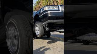 Lincoln Town Car LOWRIDER HOPPING into the air! #lowrider #hydraulic #suspension #cars  #california