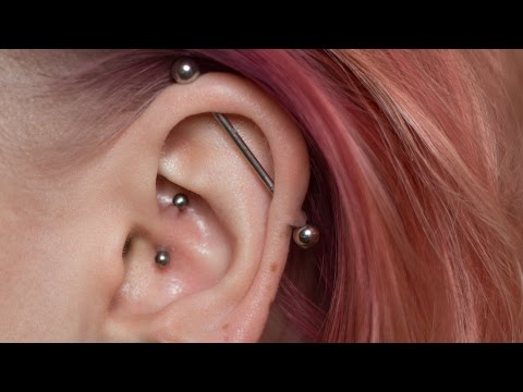 Wideo: 3 proste sposoby czyszczenia piercingu Daith