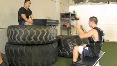 Juggernaut Training Systems-50 inch box jump with weight vest