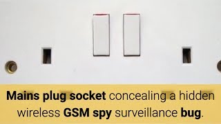 Mains plug socket concealing a hidden wireless GSM spy surveillance bug.