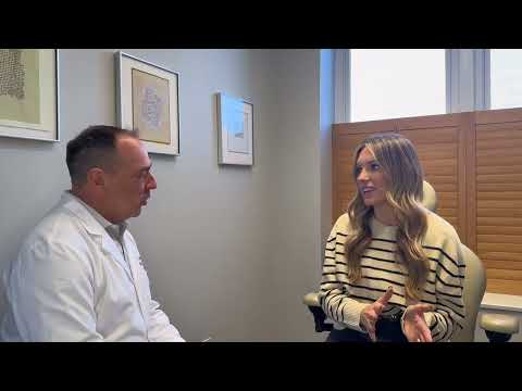 Board Certified Plastic Surgeon Dr. Sean Doherty interviews a breast augmentation patient
