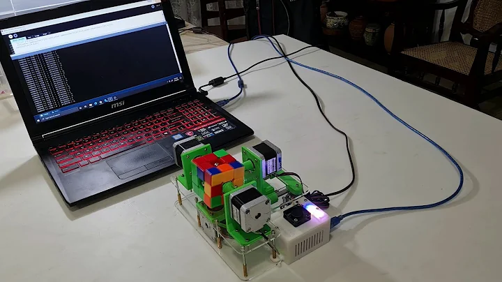 dual Axis Rubik's cube solving robot (Arduino/Processing)