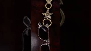 Braided leather glasses chain holder with brass motif!