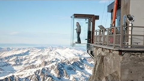Tourist heaven for thrill-seekers: Alpine glass cabin over 1km sheer drop