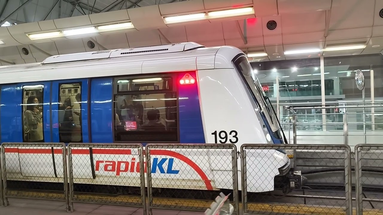 LRT Kelana Jaya Line Alstom Innovia Metro 300 (set 93) arriving and departing at KL Sentral