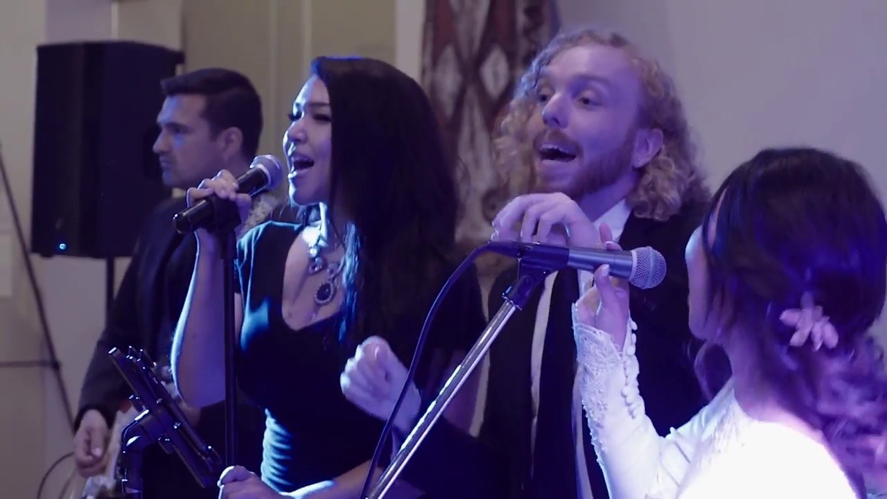 Candia performing September for wedding reception dance music