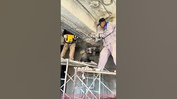 Controlled Demolition : Removing a Concrete Corbel and Exposing the Rebar