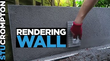 Een muur grijs stucen - Scratch coat stucen