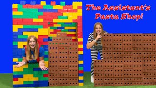 assistant crafts a play doh pasta kitchen in her giant lego house