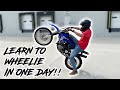 WE TAUGHT HIM HOW TO WHEELIE IN ONE DAY! ( He Did Great )!!