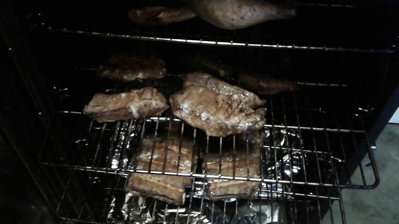 Cooking on an Electric Smoker w/Cajun Seasoning - YouTube