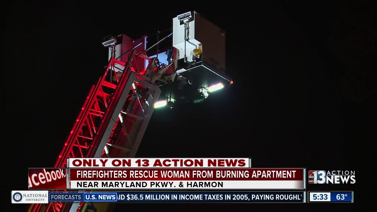 Firefighters rescue woman from burning apartment - YouTube