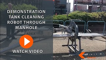 Demonstration tank cleaning robot through manhole | KOKS Robotics