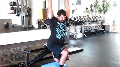 Rear Foor Elevated Split Squat Iso Hold w/ Med Ball Slam