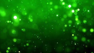 Motion Graphics Glowing Light Particles Flying on a Green Animated Background